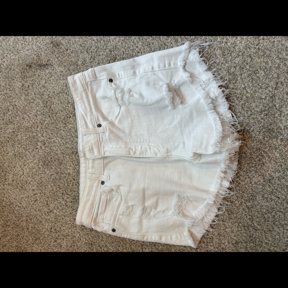 eunina distressed white jean shorts